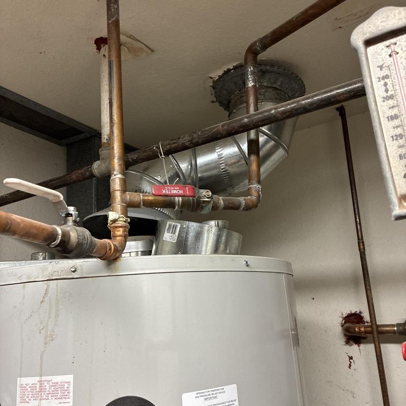 Water heater vent pipe with copper plumbing connections