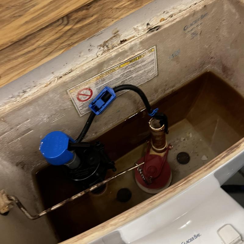 Toilet fill valve and flapper inside tank Toilet fill valve and flapper inside tank