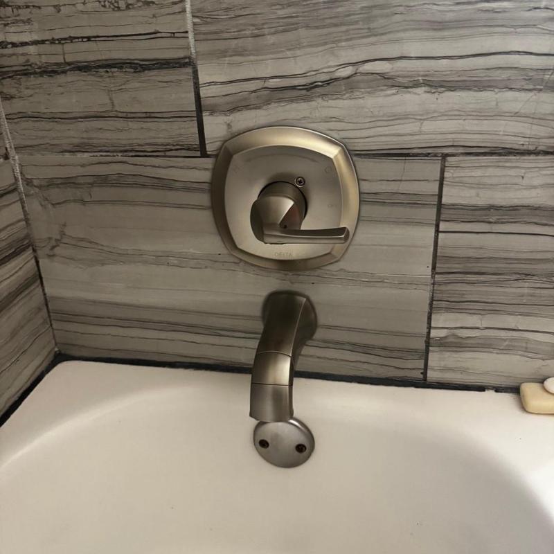 Shower faucet and tub spout installation in bathroom