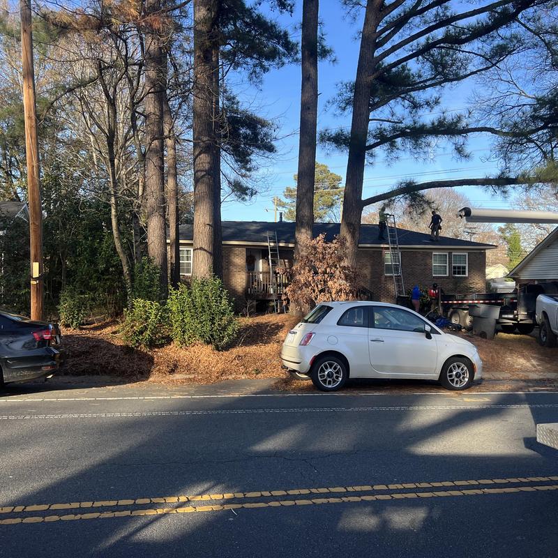 Asphalt shingle roof with new ridge vents installation