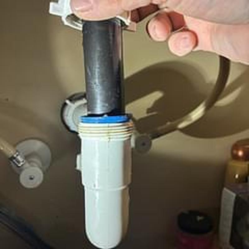 P-trap drain pipe with new washer installation