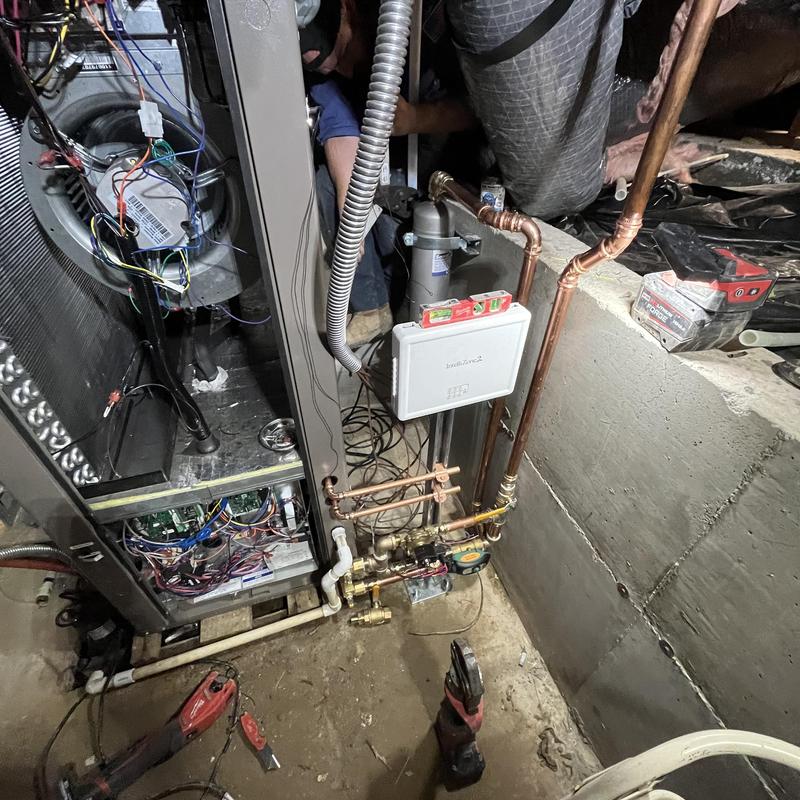 Geothermal heat pump system with new zoning and ducting