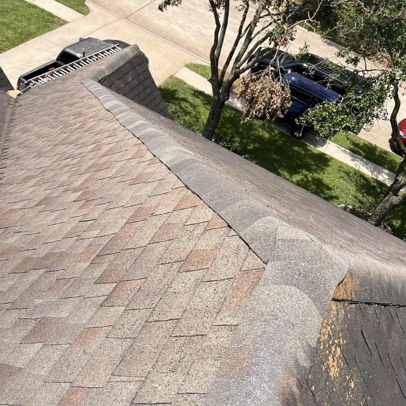Ridge cap shingles replaced on residential roof