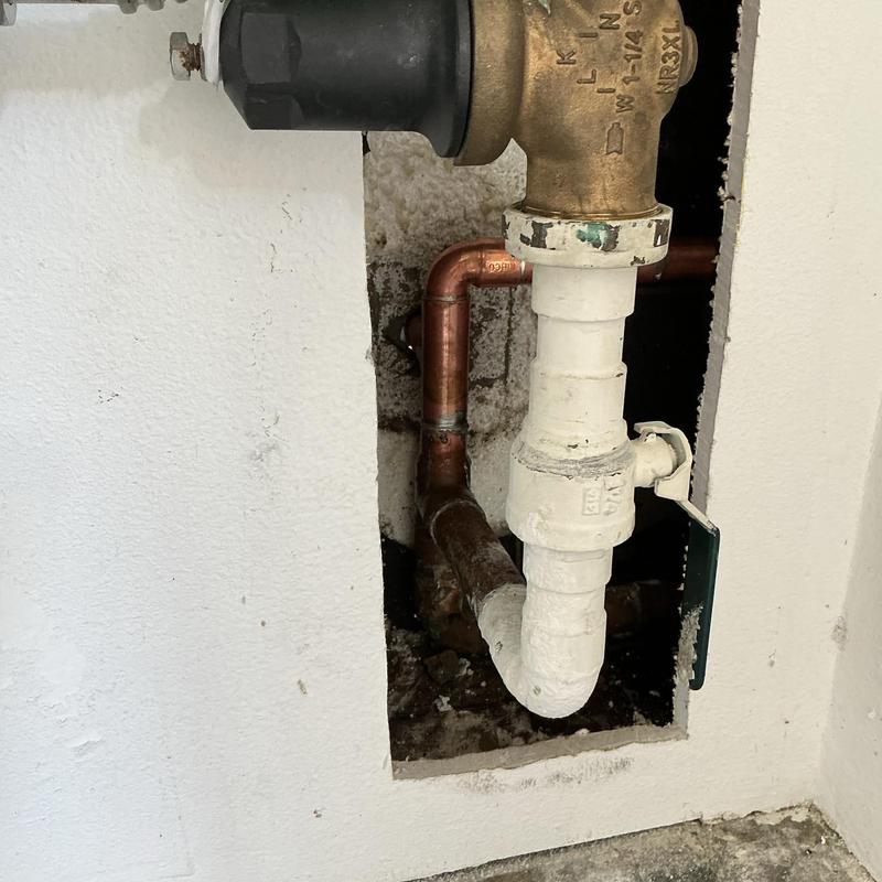 Copper irrigation pipe and valve inside wall cutout