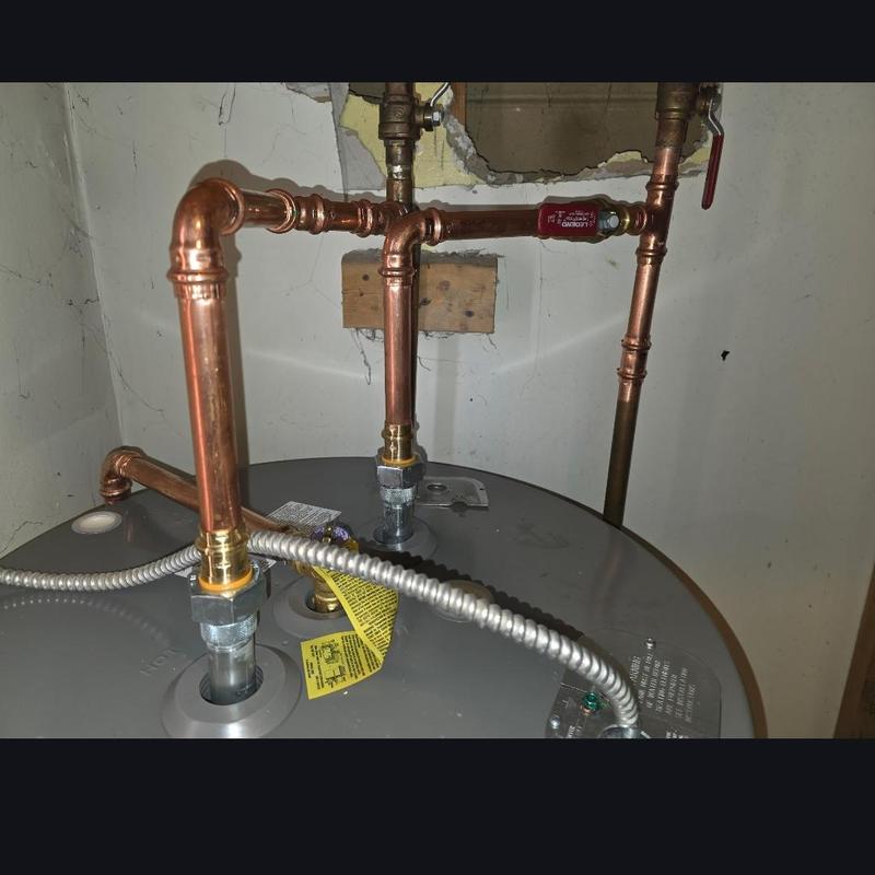 Electric water heater with new copper pipes and valves