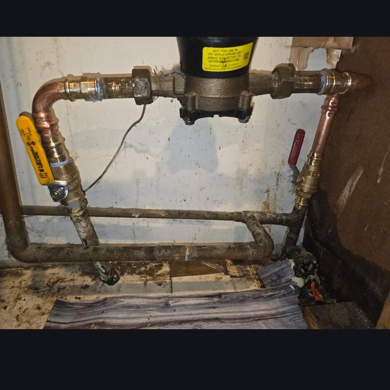 Water meter valve replacements with copper piping installation