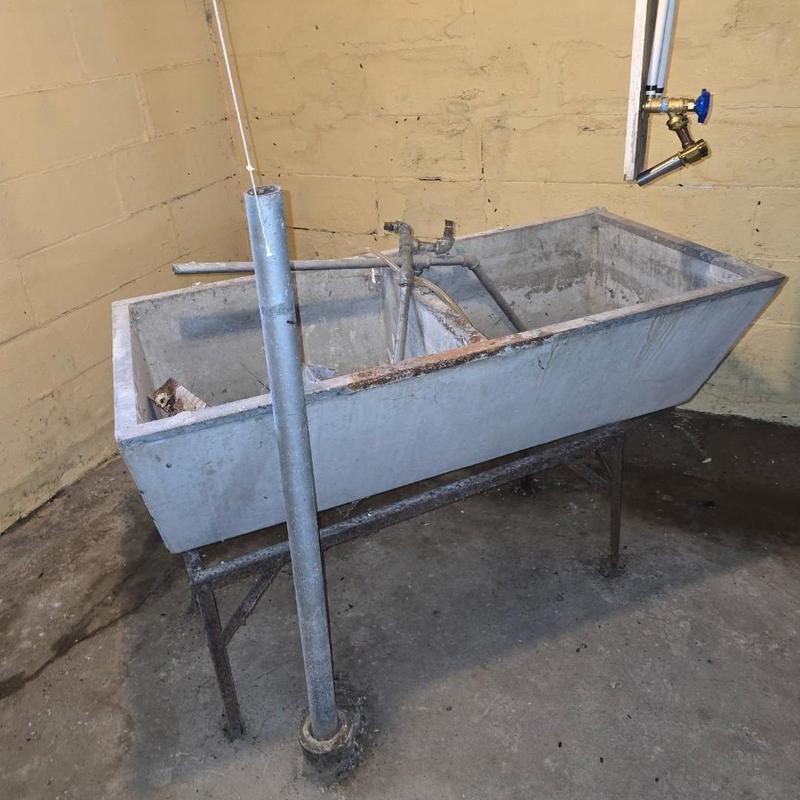 Concrete utility sink with plumbing and water line estimate