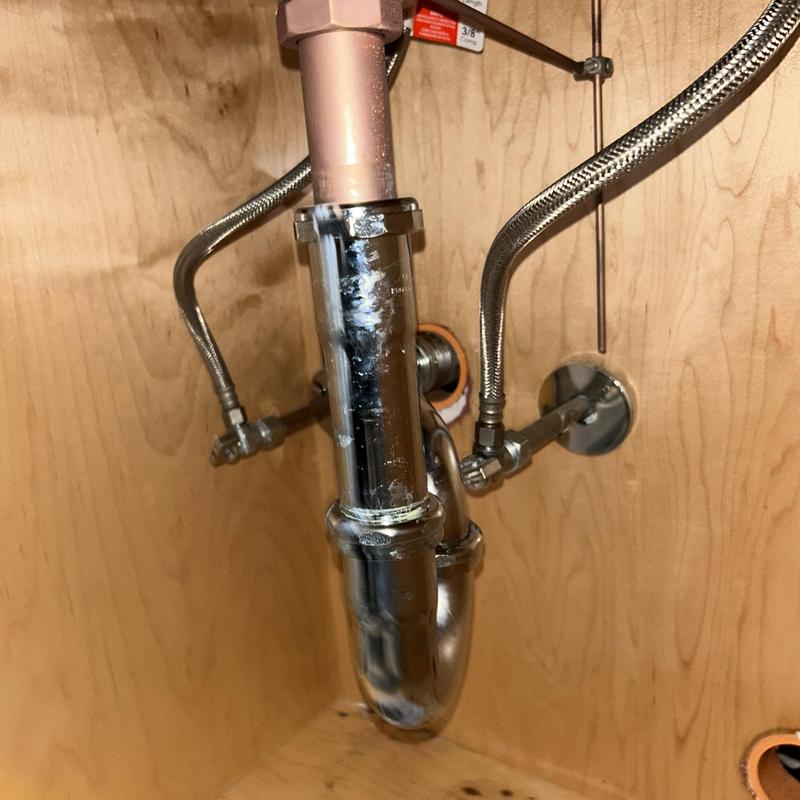 P-trap and extension pipe under sink repair