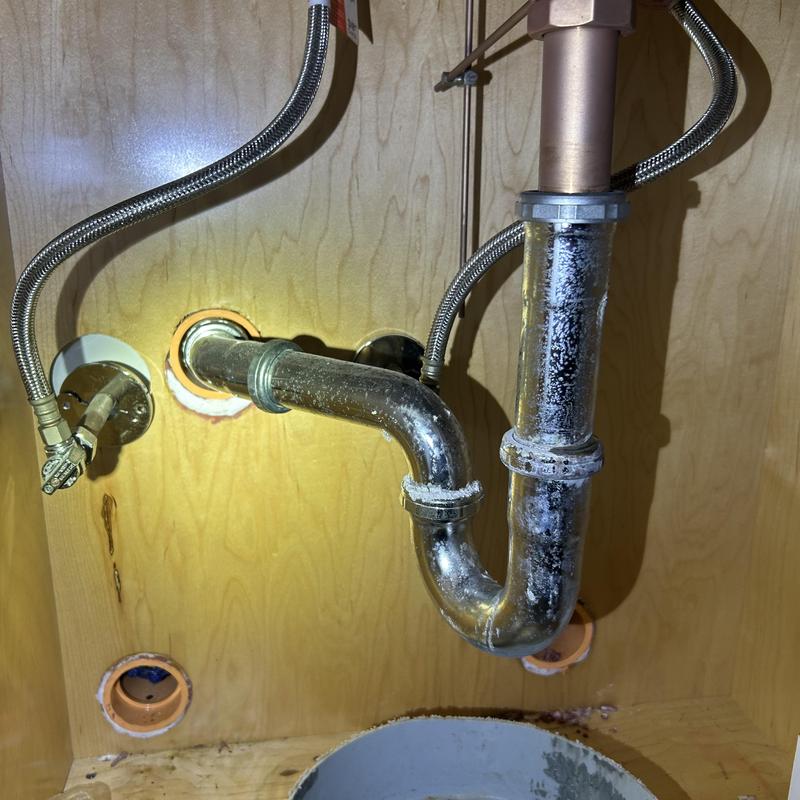 P-trap and extension pipe under sink drain system
