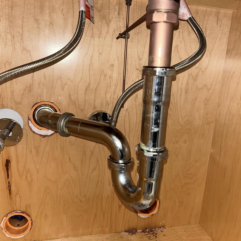 P-trap and drain pipe extension under sink repair