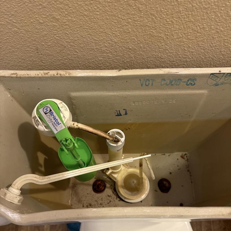 Toilet tank float and gasket replacement parts inside tank