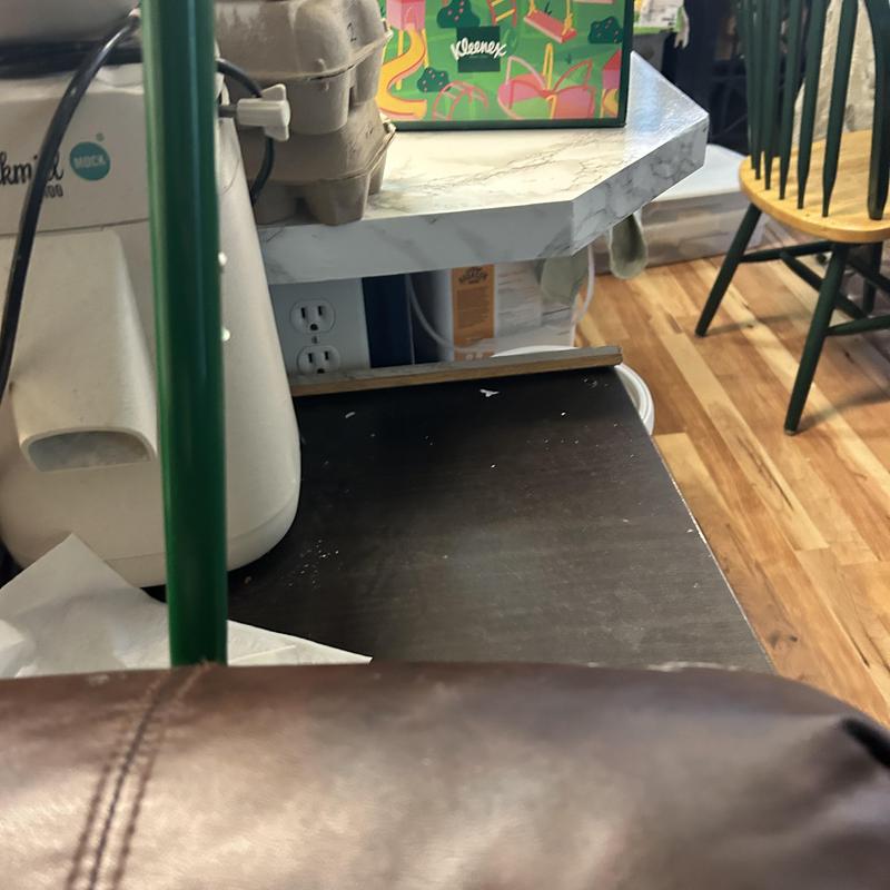 Kitchen island electrical outlet behind appliances in Boise