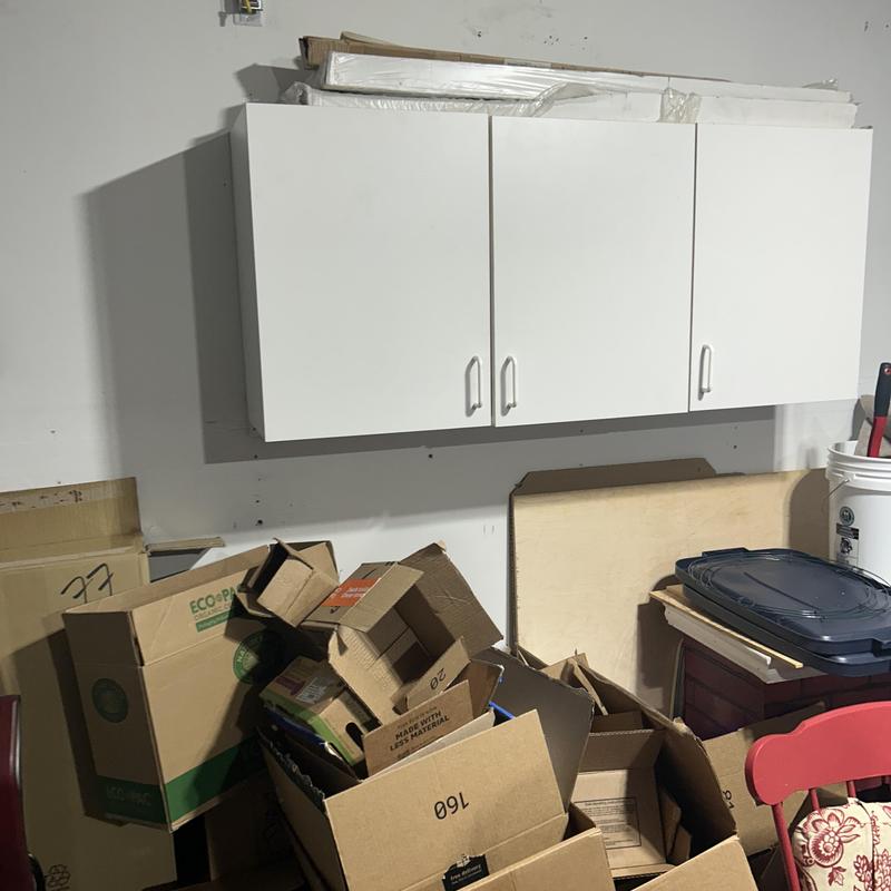 Kitchen island electrical outlet relocation in garage area