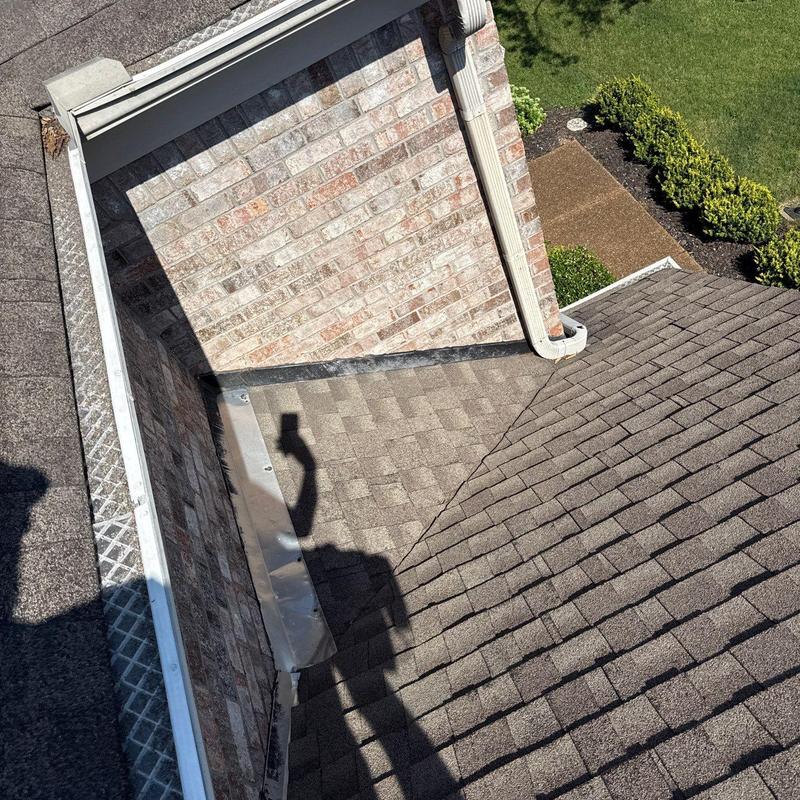 Asphalt shingle roof and metal flashing inspection