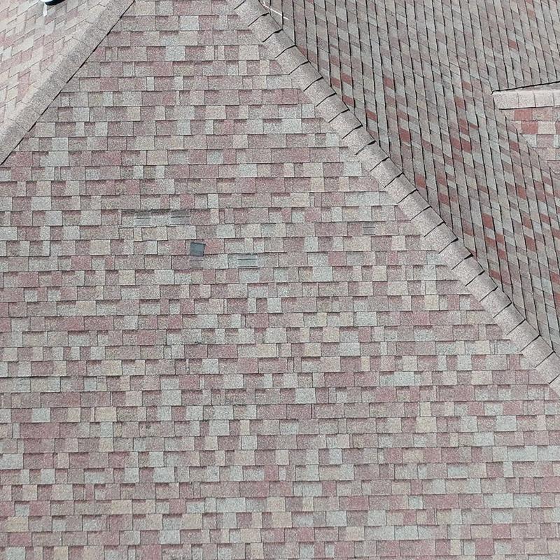 Asphalt shingles roof with hail damage in Brentwood TN