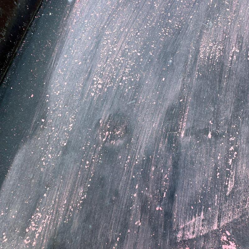 Roof shingles with hail damage and impact marks