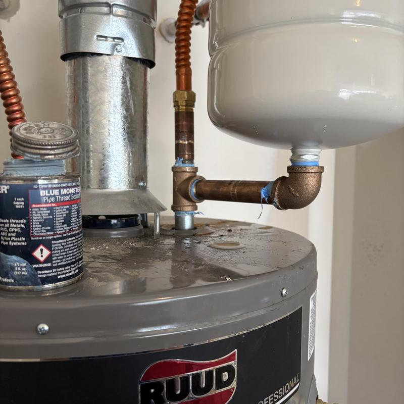 Water heater expansion tank with new brass piping