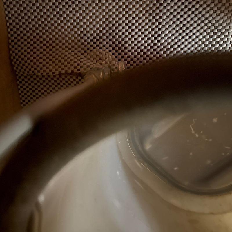 Water heater pressure relief valve close-up inside tank