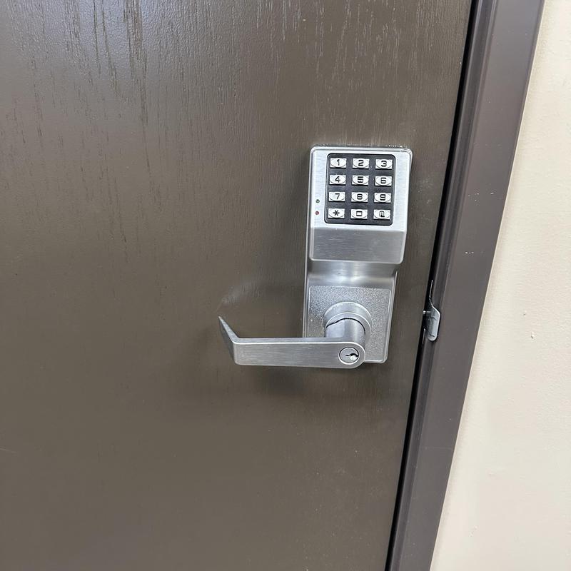 Commercial keypad lock with lever on office door