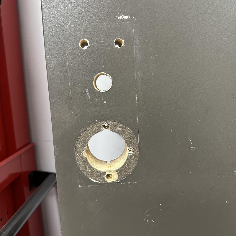 Door lock holes covered after keypad removal