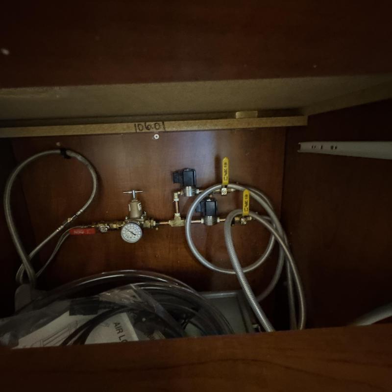 Water manifold for eyeglass edger installation with valves