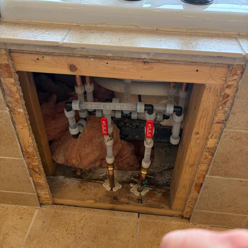 Laundry sink piping with shut-off valves and insulation