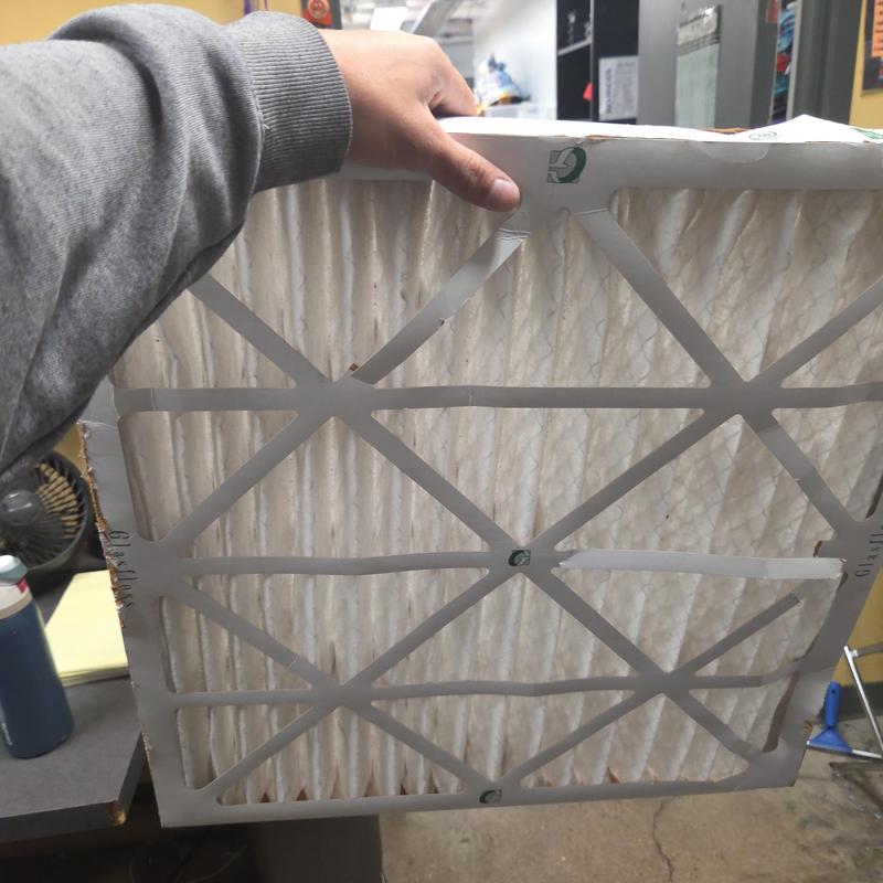 HVAC air filter held inside maintenance room