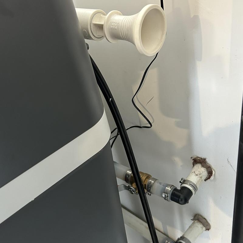Water softener installation with piping and valves