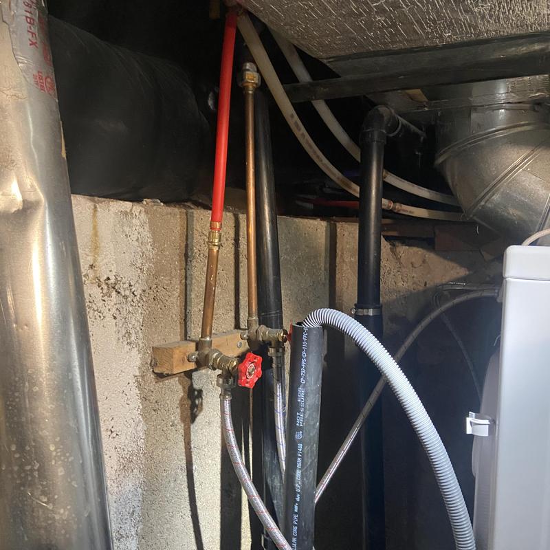 Washing machine drain hose and plumbing in basement Washing machine drain hose and plumbing in basement