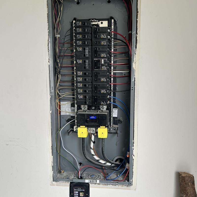 Electrical panel with new single pole breakers installed