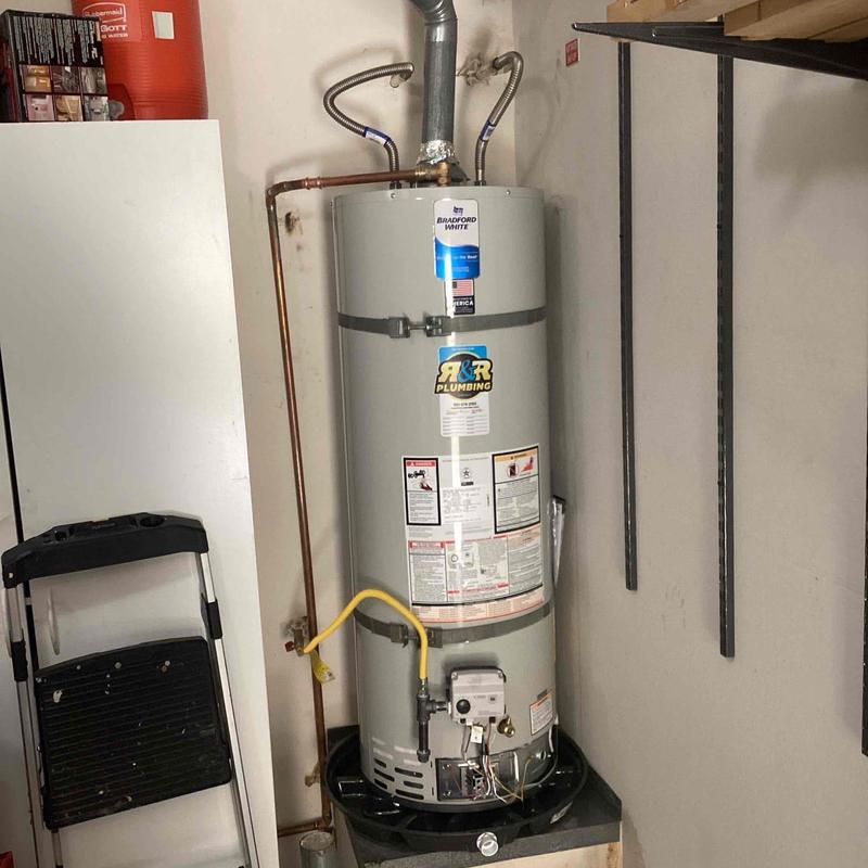 50-gallon water heater installation in utility room
