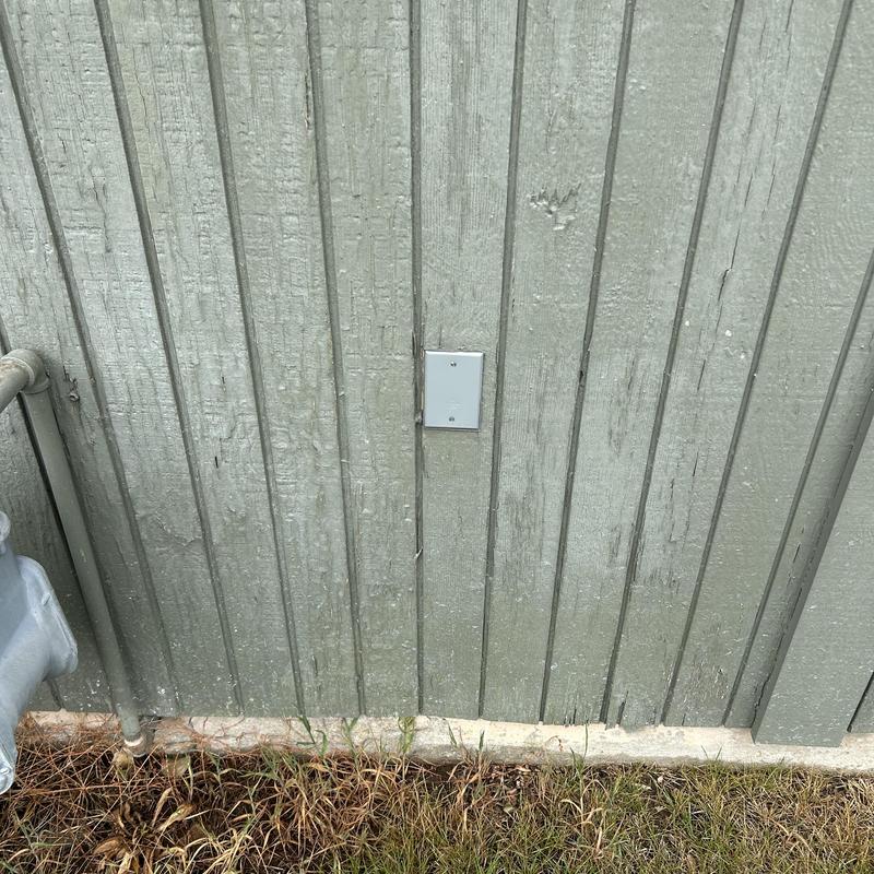 Exterior electrical receptacle fitted with weatherproof blank cover