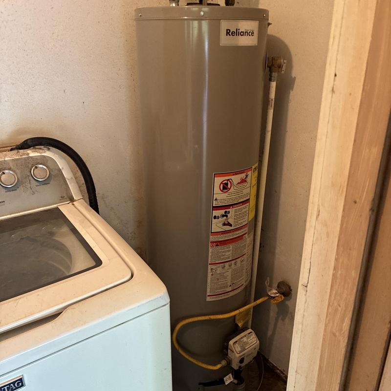 Water heater sediment buildup with drain pan cleaning