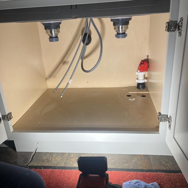 Kitchen sink plumbing rough-in with water lines and drain pipe Kitchen sink plumbing rough-in with water lines and drain pipe