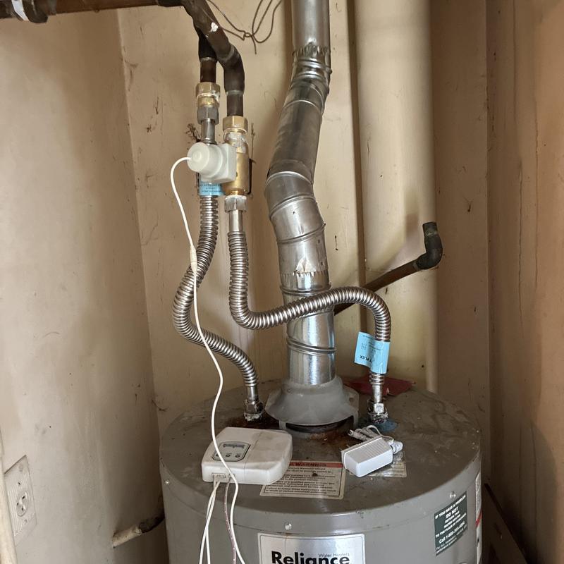 Water heater with new flex lines and flood stop system