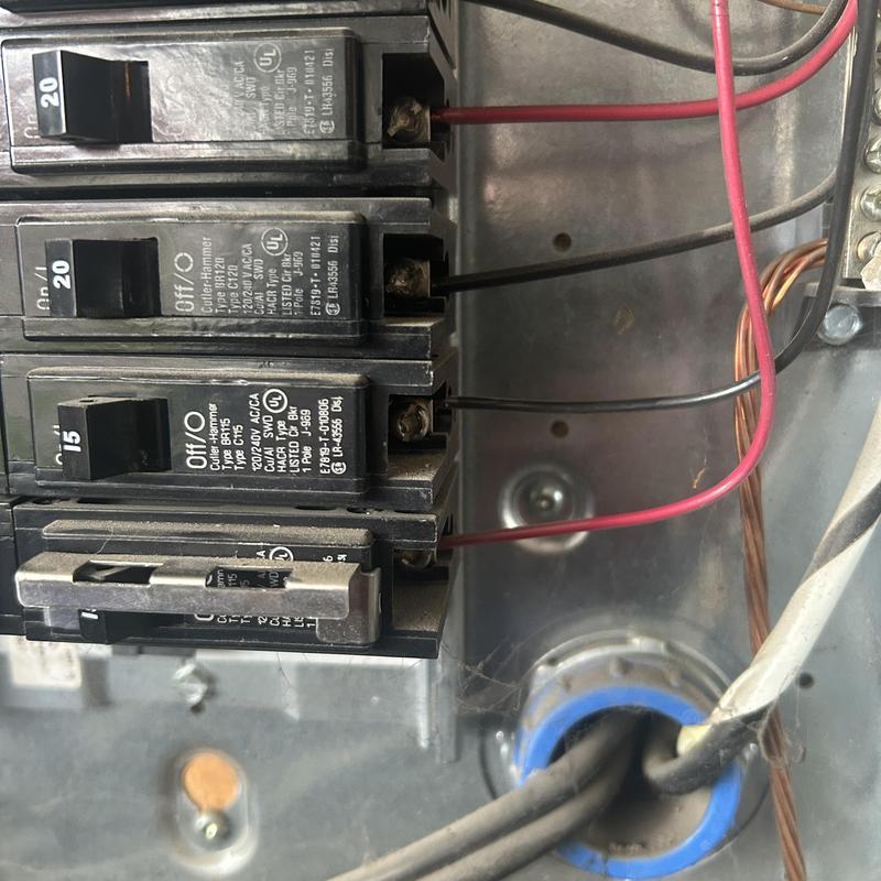 Main service panel with circuit breakers and wiring