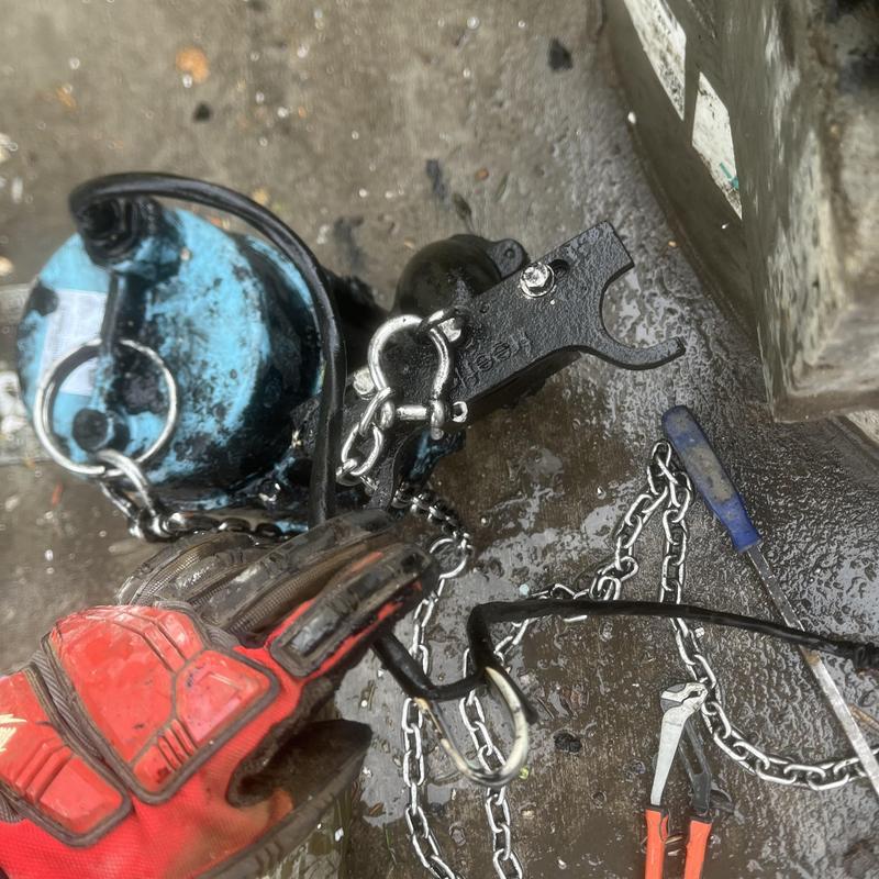 Ejector pump with jammed plastic during inspection