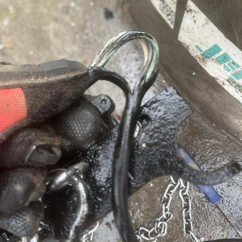 Ejector pump impeller shaft with jammed plastic debris