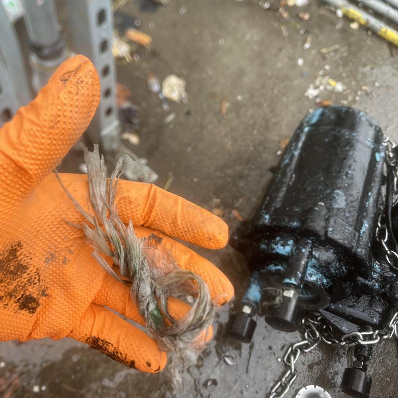 Ejector pump and removed plastic debris on impeller shaft