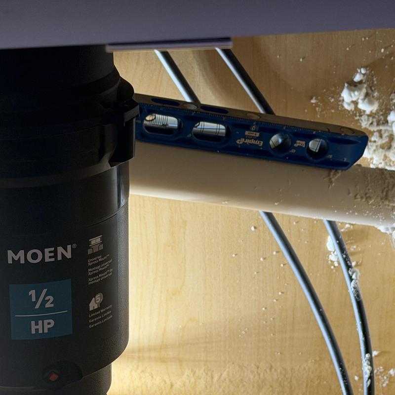 Garbage disposal and drain pipe level check