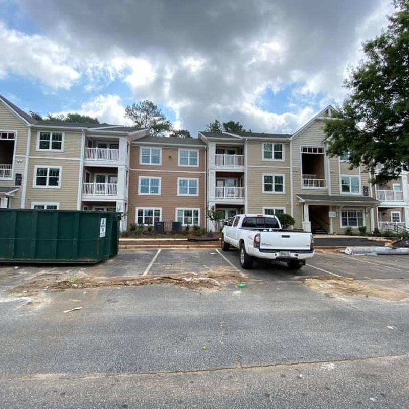 Asphalt shingle roof on apartment complex exterior