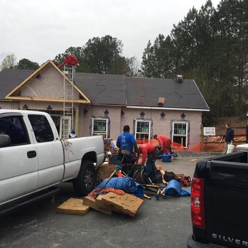 Asphalt shingle roof installation on residential house