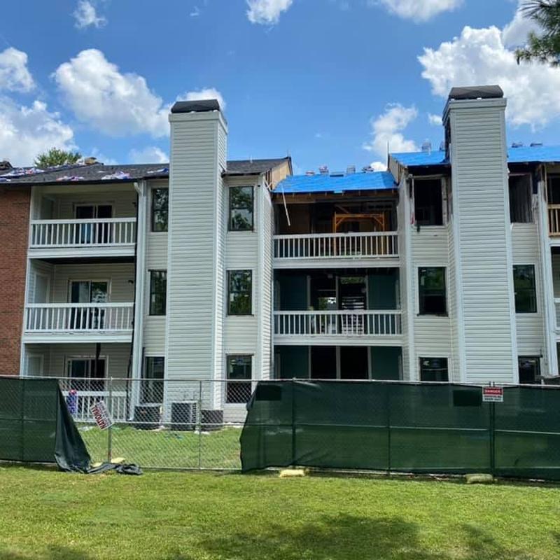 Asphalt shingle roof replacement on apartment buildings