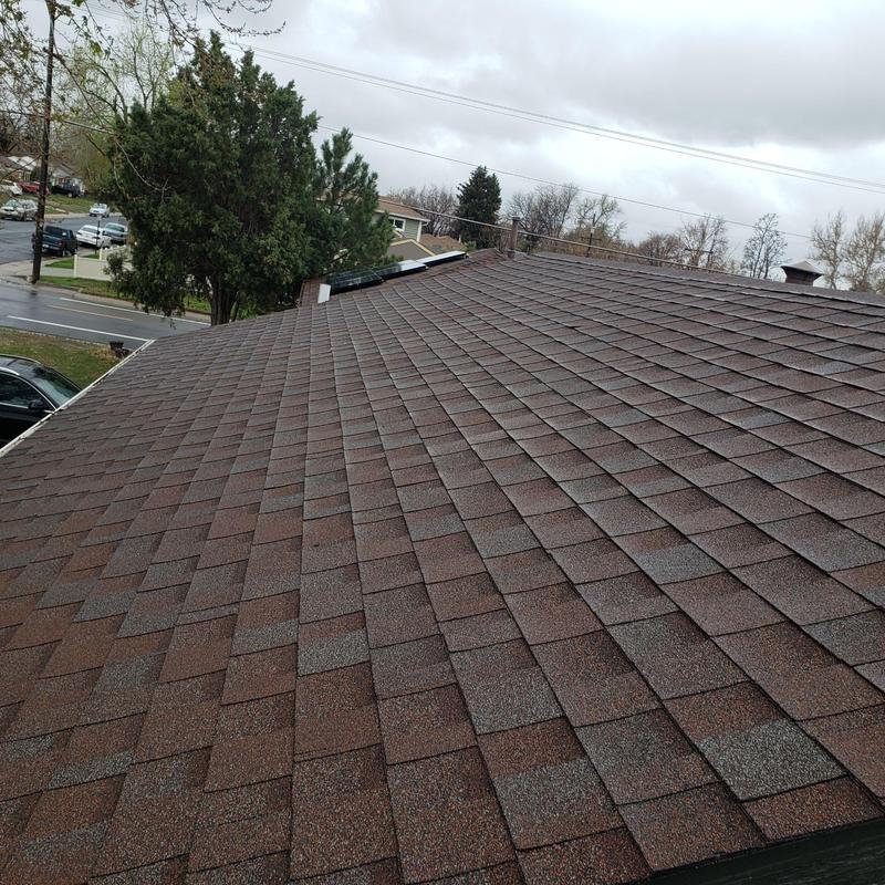 Asphalt shingle roof inspection after hail damage