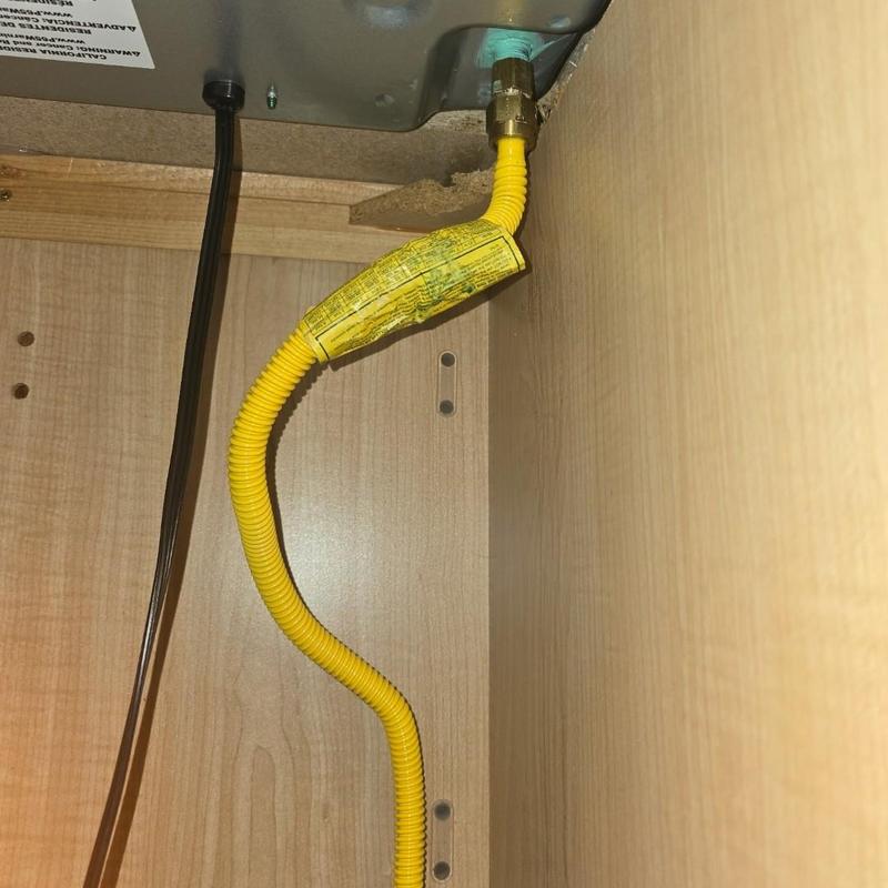 Gas whip installation under kitchen sink cabinet