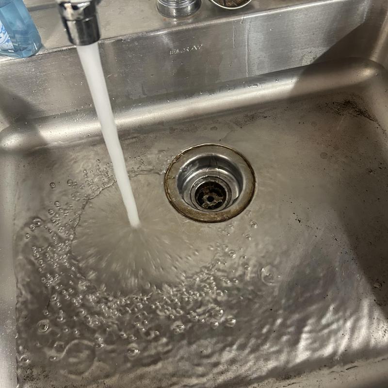 Kitchen sink drain with running water and secondary lines Kitchen sink drain with running water and secondary lines