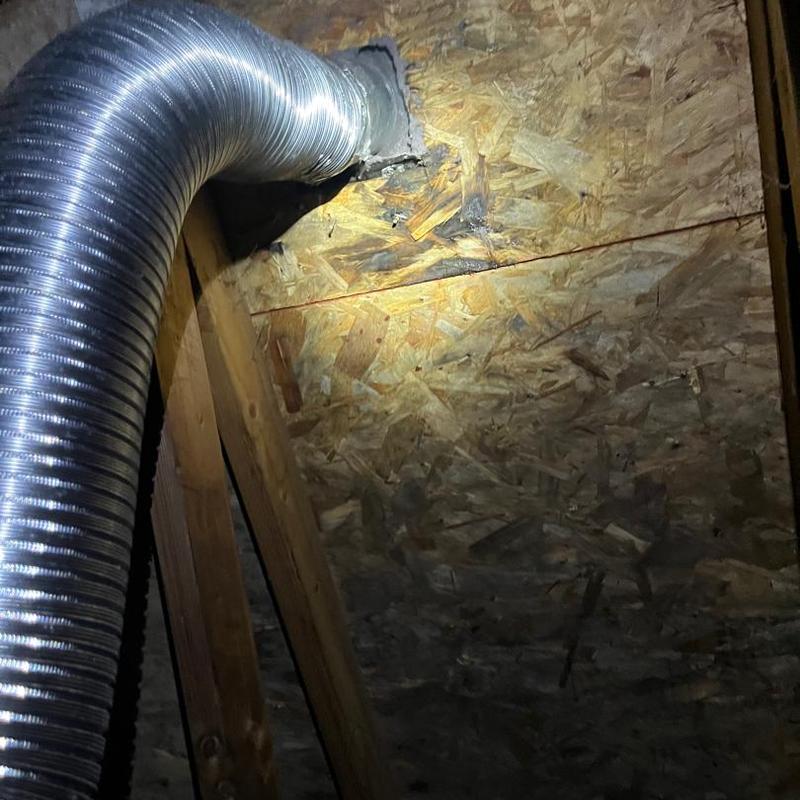 Dryer vent flapper leaking on attic roof sheathing