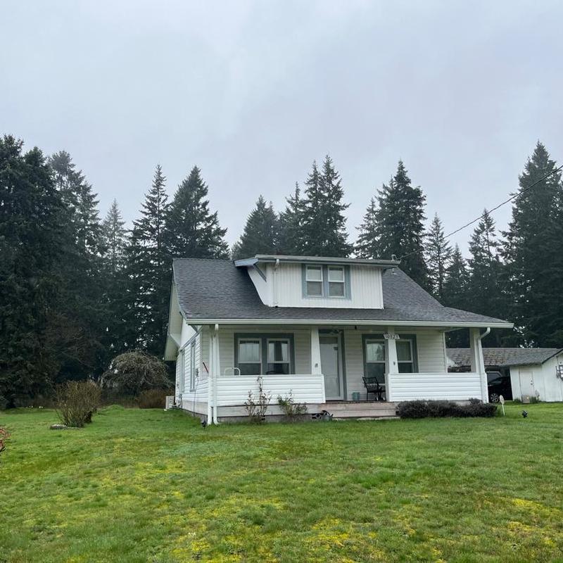 Roof debris removal from residential house exterior