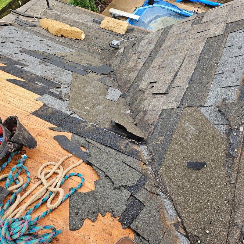 Asphalt shingle roof tear-off on Collierville home