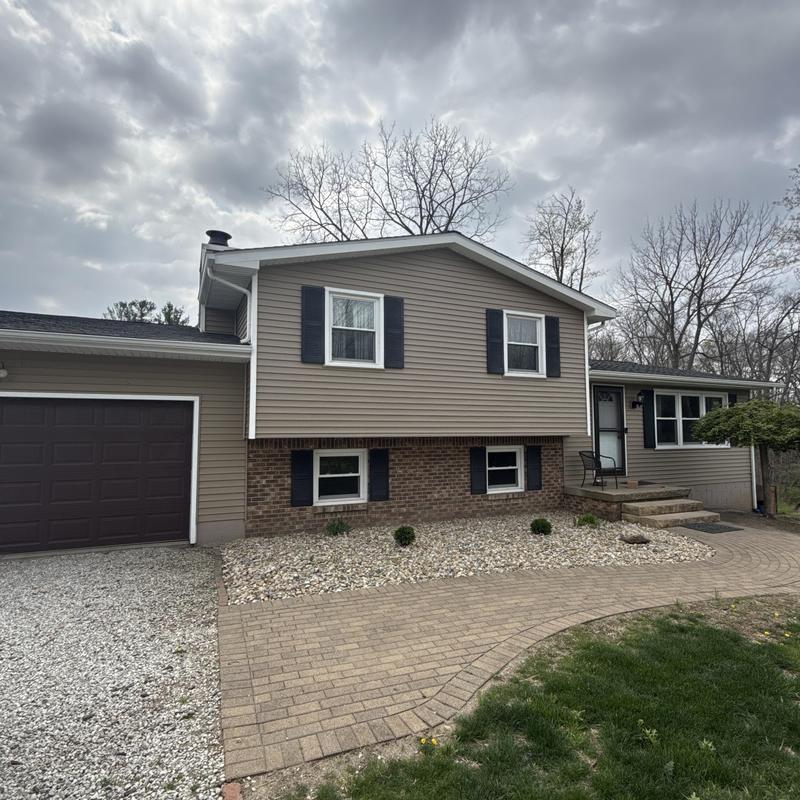 Asphalt shingle roof and siding on residential home